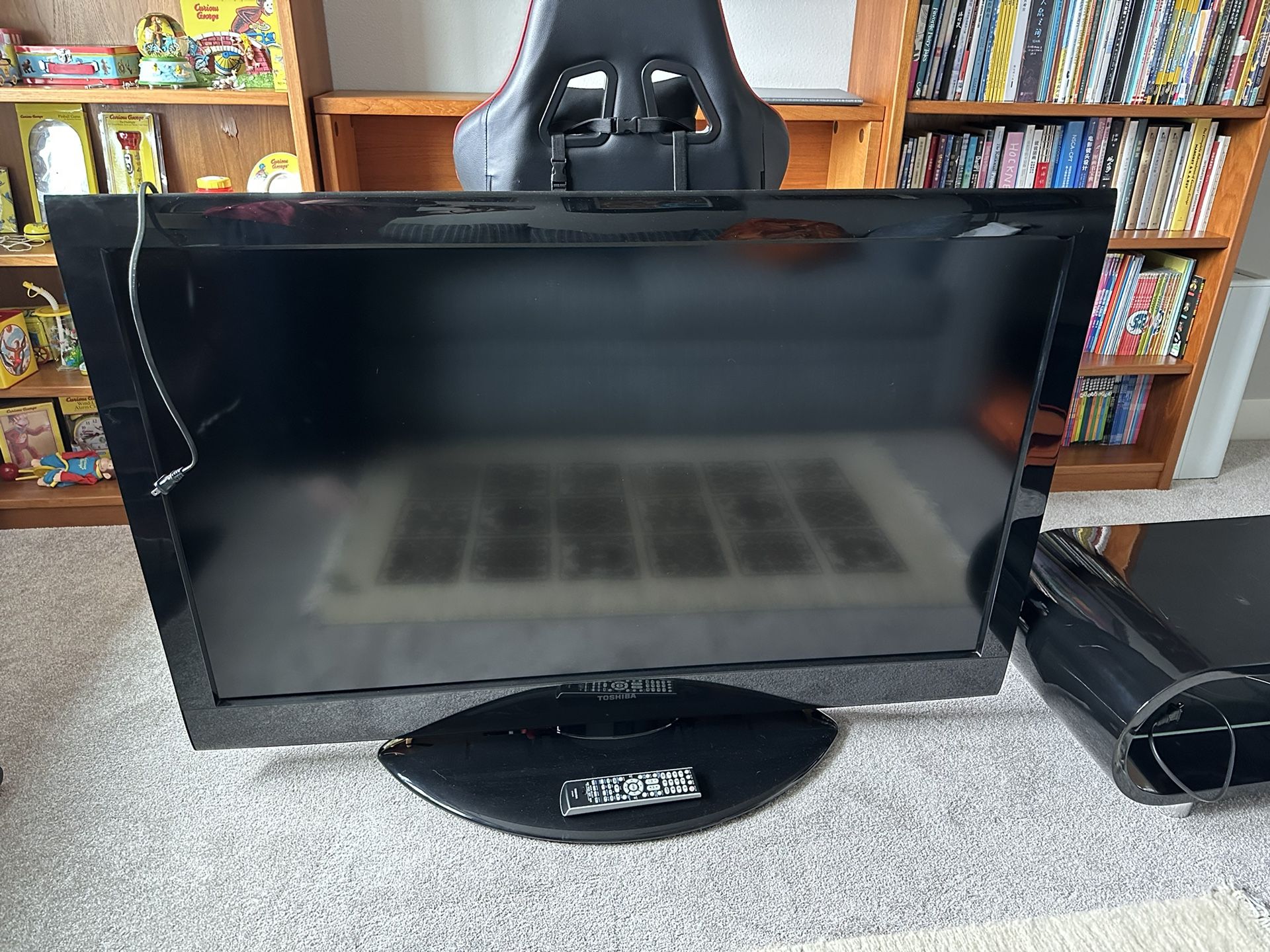 Tv, Tv Stand, Blueray Player 