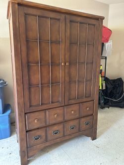 Armoire (clothing or TV)