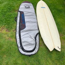 Surfboard with board bag