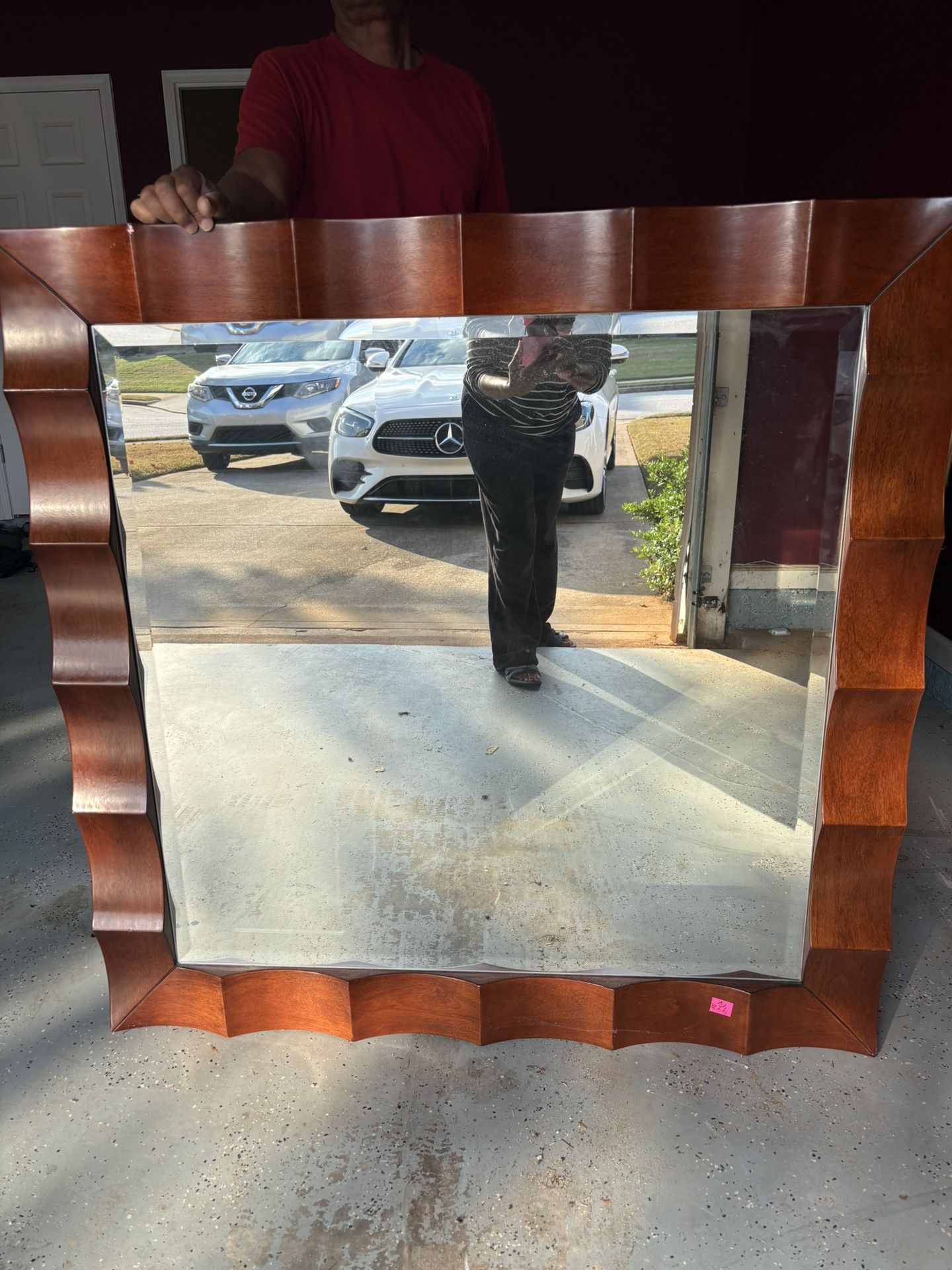 Beautiful Sculpted wooden Mirror 4’ by 4’ , rich Brown.