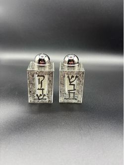 Standing 2.25 inches tall, they are in pristine condition, ready to grace a Shabbat or holiday table. A wonderful addition to any Judaica collection o