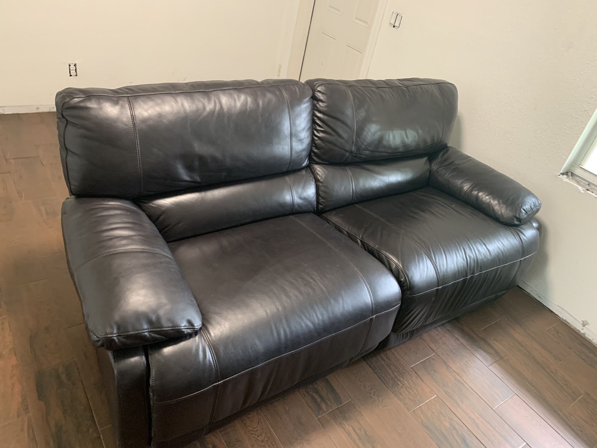 Power recliner leather sofa