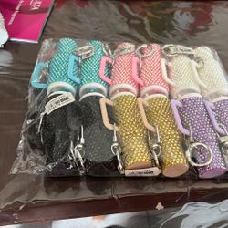 sparkling rhinestone mini tumbler keychain that can function as a lip balm holder or small storage compartment