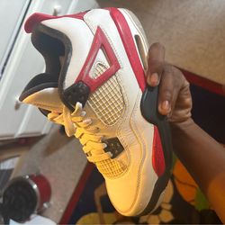 Jordan 4 Red Cements