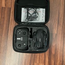 Small Drone With Bluetooth Connectivity, Spare Battery, And Camera