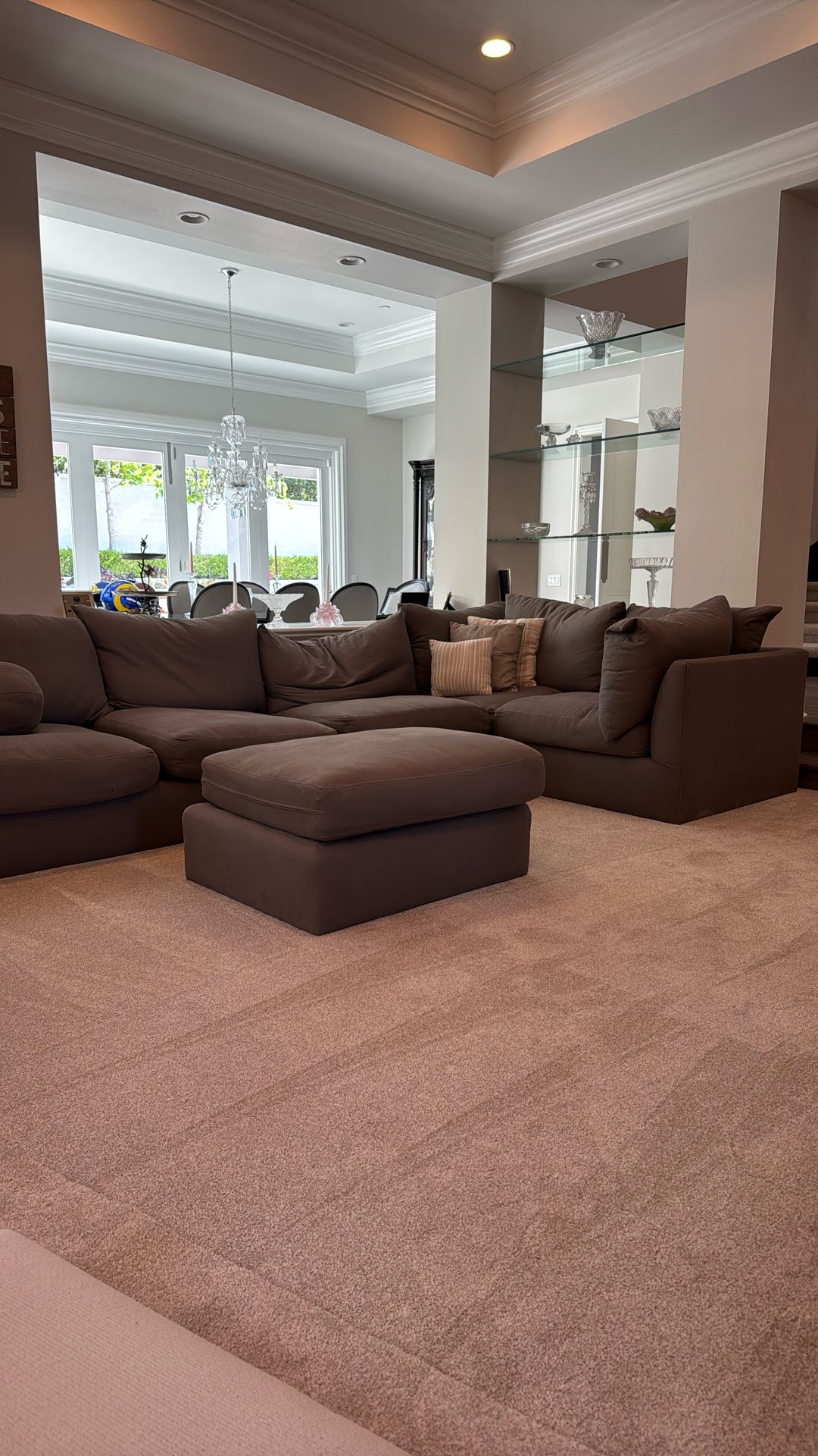 Kreiss Sectional Sofa With All The Pillows And Ottoman