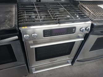 KitchenAid stainless steel 4-burner dual-fuel slide-in range - Free delivery