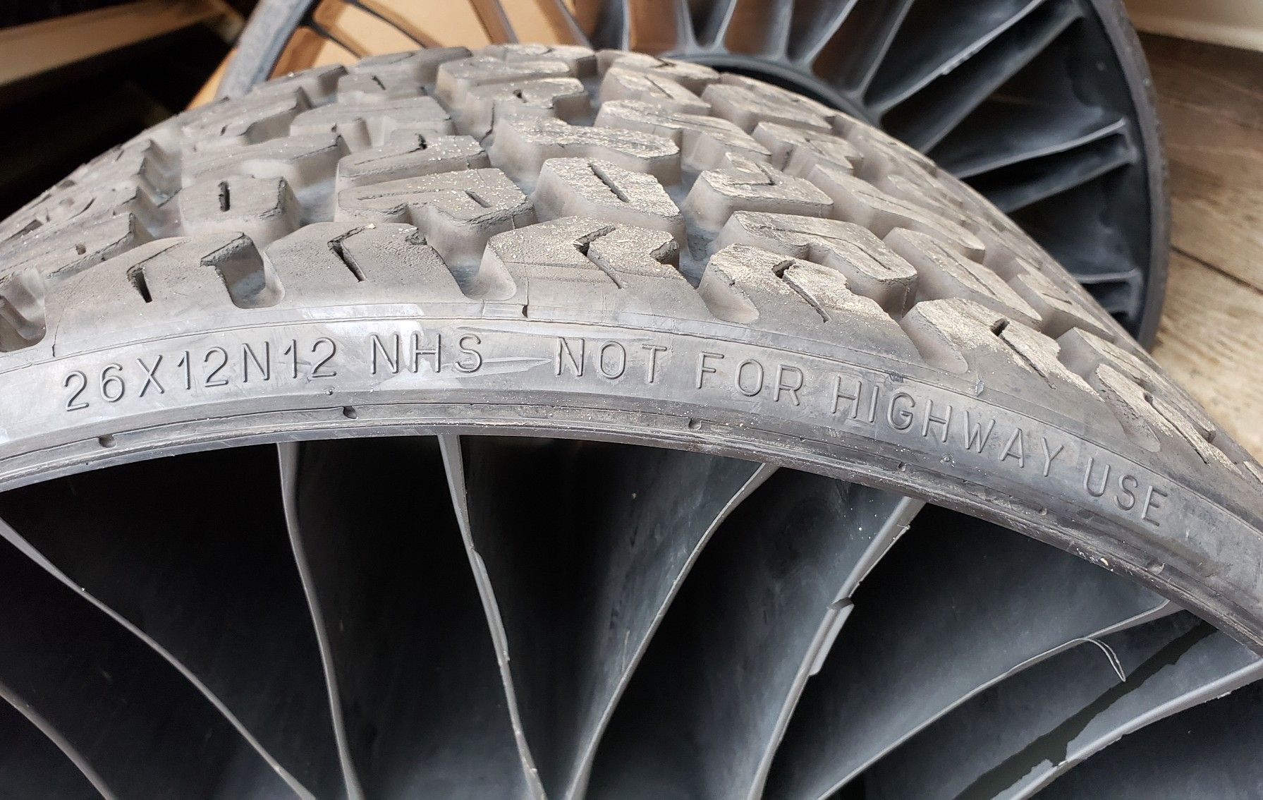 Pair of 26x12N12 Michelin "X Tweel Turf" lawnmower tire/wheel assembly