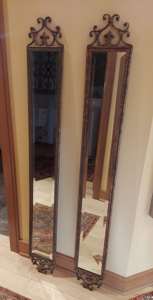 Two Upright Beveled Mirrors