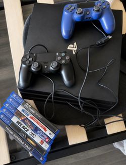 PlayStation 4 Pro Bundle – 2 Controllers + Games
