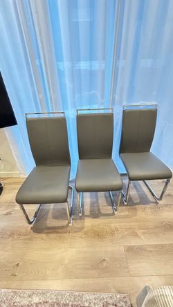 4 Gray Chairs with Silver Trim