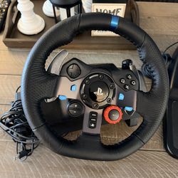 Logitech G29 Driving Force racing wheel and pedal set.