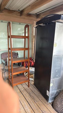 Two wooden ladder shelves