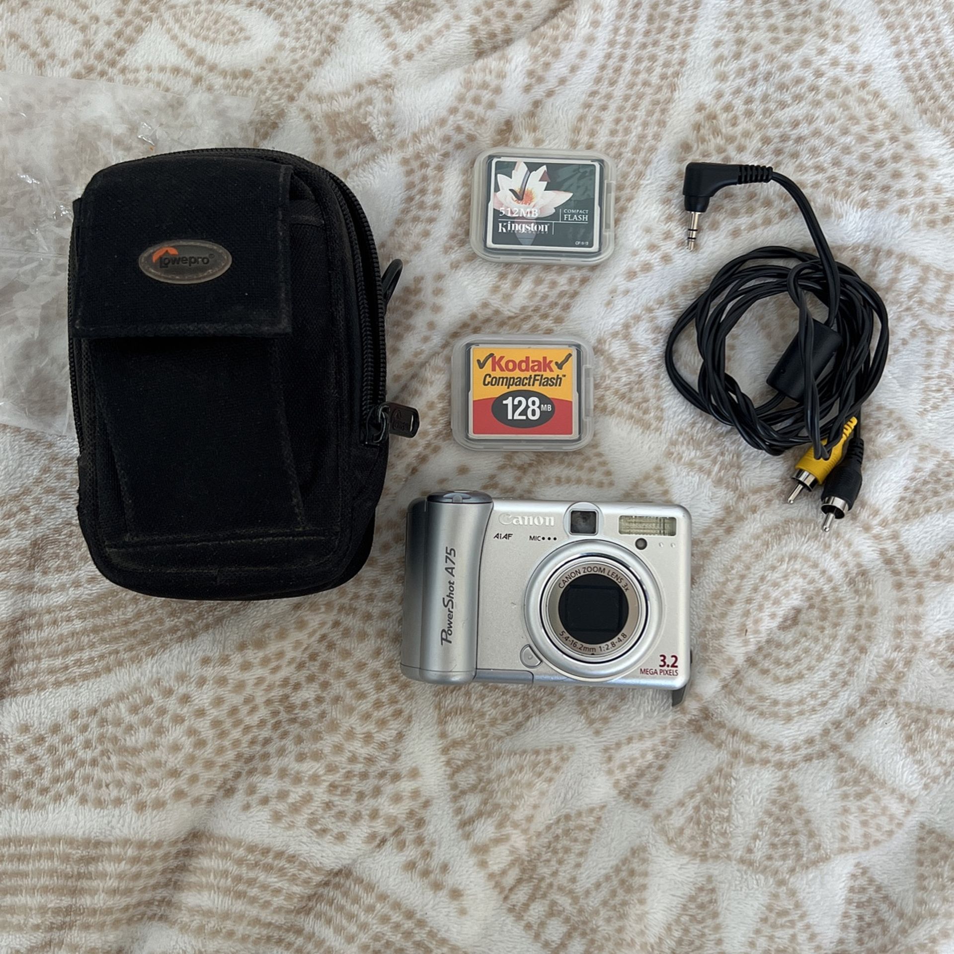 Canon Powershot A75 camera w/accessories*