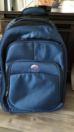 Back pack with pull out handle and wheels