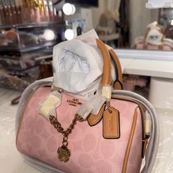 Coach mini rowan  with charms NWT SOLD OUT