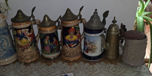 Group lot vintage beer steins, 7 pieces total. Mix ceramic, metal lids. Various conditions. $45 Total