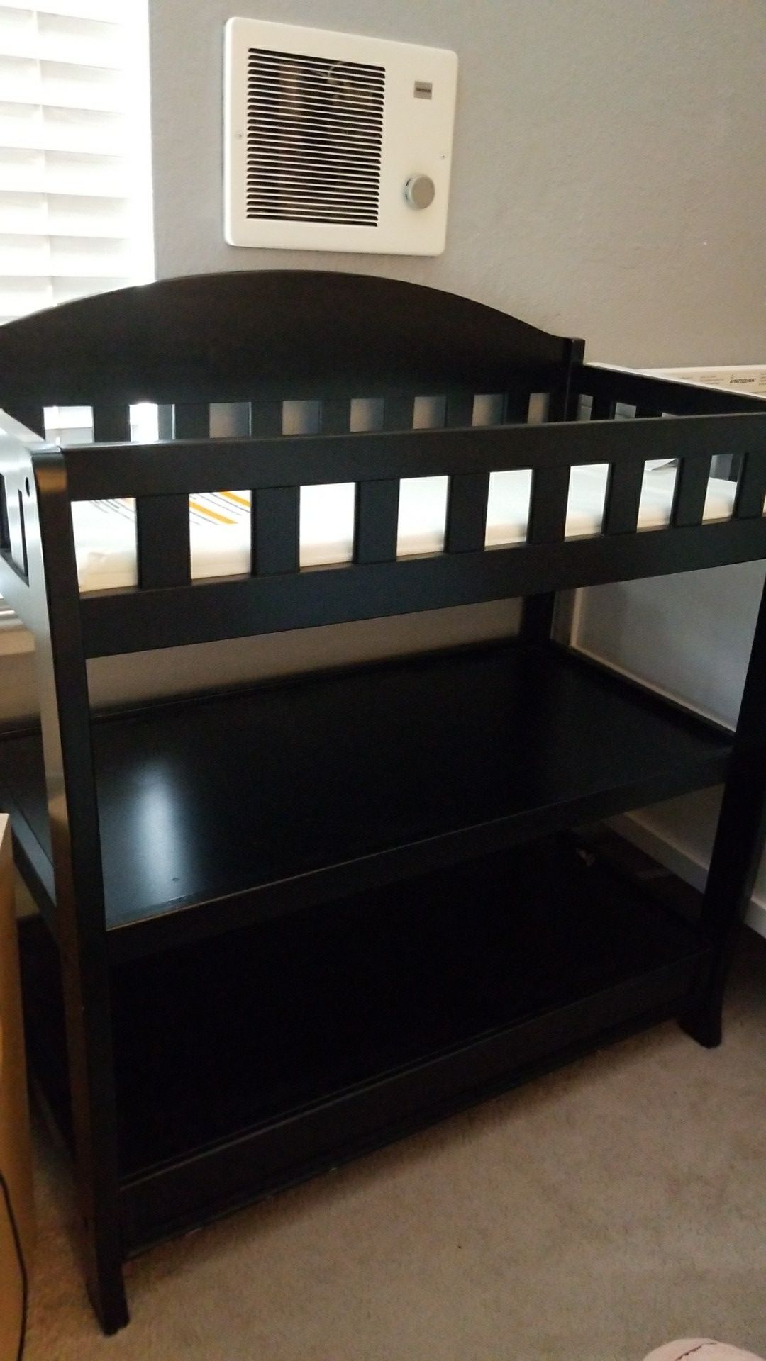 Black changing table in new condition