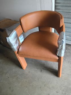 Vegan faux Leather = height
18.75 in
Color
Orange
Material
Faux Leather
Seat color
Cognac
Max load
300 lb
Seat width
20.25 in