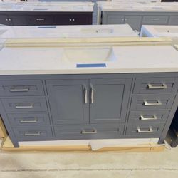 60 in. W x 22 in. D Single Sink Bath Vanity in Gray with White Top $925 