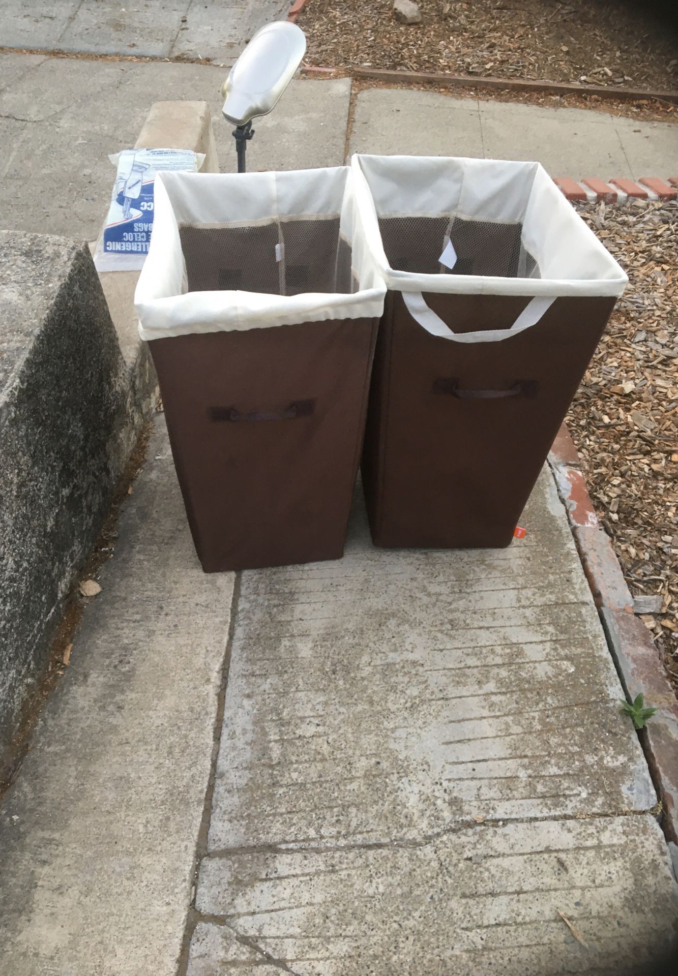 2 hampers on driveway for pickup 1504 Pine Street Martinez