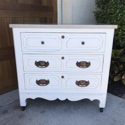 Three Drawer Dresser With Quartz Top And Casters