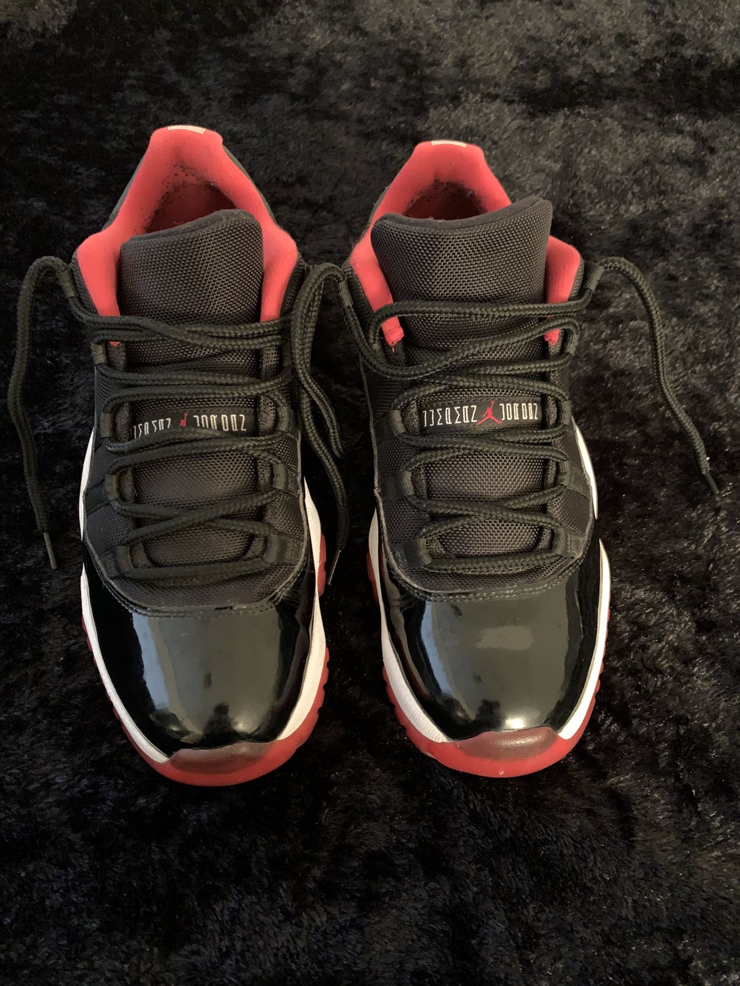 Jordan 11s Low • Bred • Size: 11.5