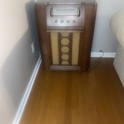 Vintage Trutone Radio Console Repurposed into a Bar Cabinet.