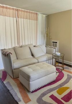 Cream Couch with Ottoman and side tables