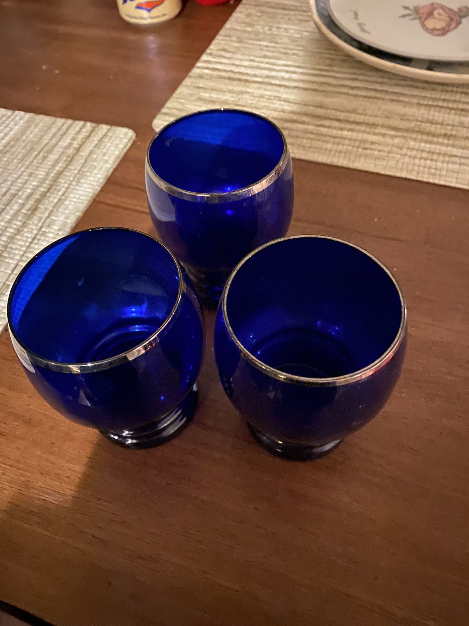 cobalt blue glasses with silver rims