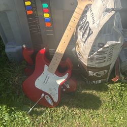 Two Ps2 Guitar Hero Guitars And One Xbox One Guitar