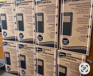 Portable air-conditioning units 13,500 BTU cools 450 ft.² comes with window kit