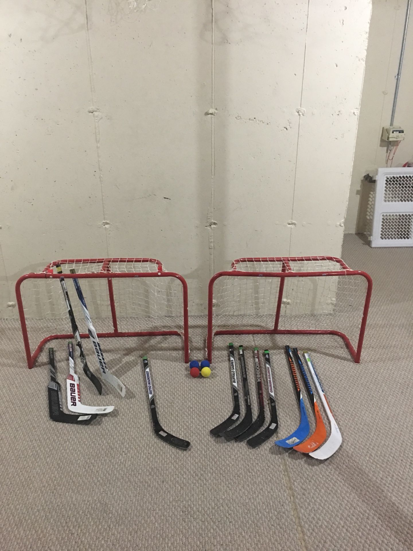 Shinny hockey sticks, goals and balls