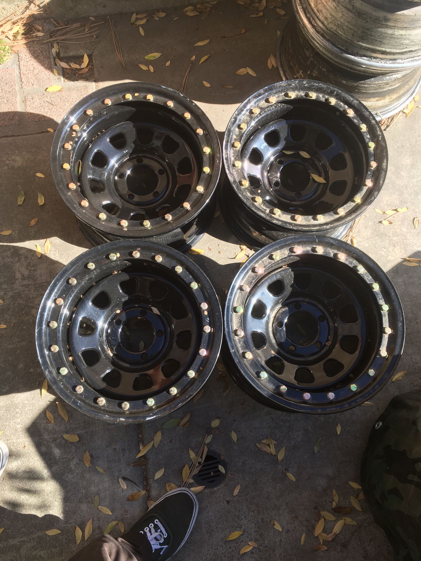 15 inch black 5x4.5 older jeep or ranger wheels rims