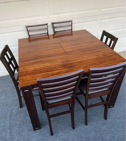 7-PC HIGH TOP BROWN FINISHED DINING SET (TABLE WITH EXTENSION LEAF AND 6 PADDED CHAIRS)