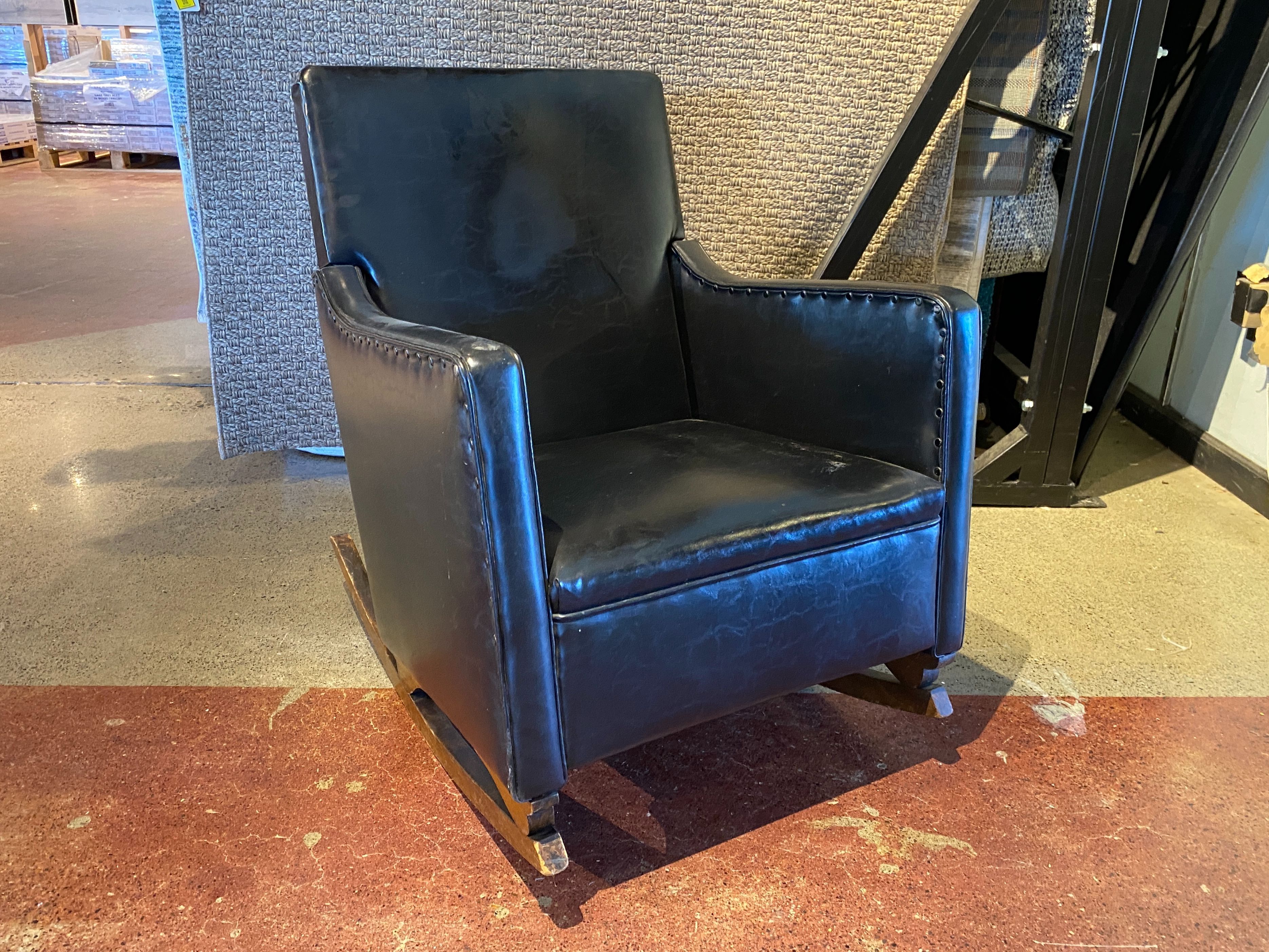 Chic Black Rocking Chair w/ Subtle Stud Trim
