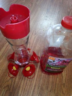 Humming Bird Feeder And Food