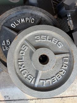 X6 OLYMPIC BARBELL CAST IRON PLATES