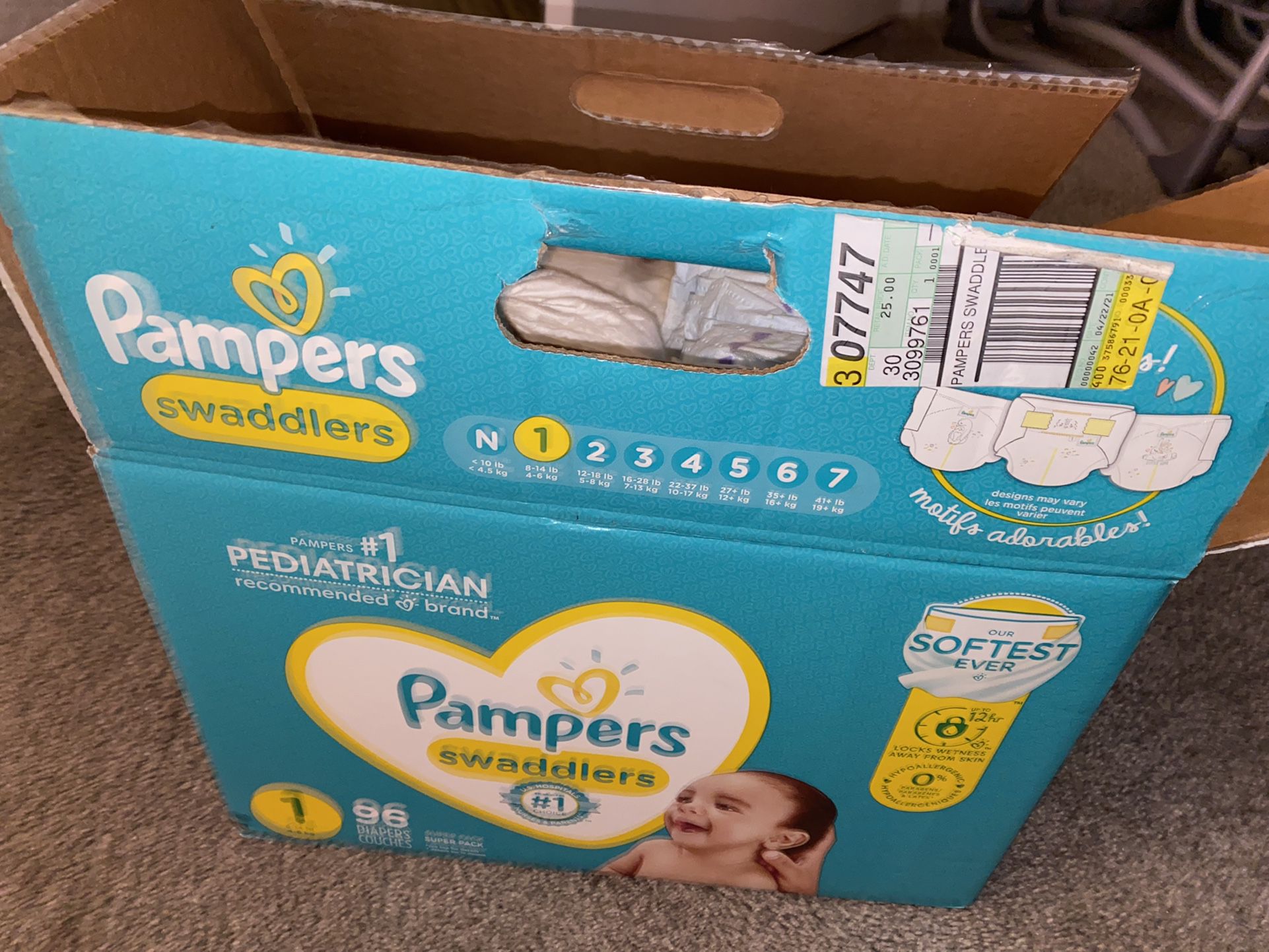 OPENED BOX OF DIAPERS 