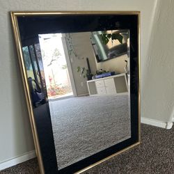 black and gold mirror 