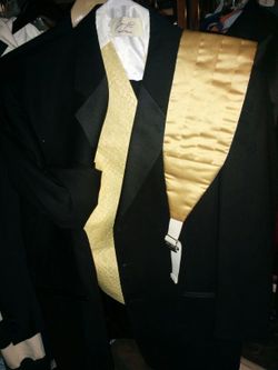 Men tuxedos different sizes with vest