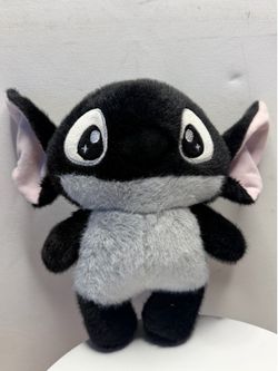 Unlike the classic blue version, this collector's edition features a gothic aesthetic: the main body is covered in black fur, the belly and muzzle are