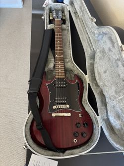 Electric Guitar, Guitar Case, Guitar Strap, Guitar Stand, Amp.