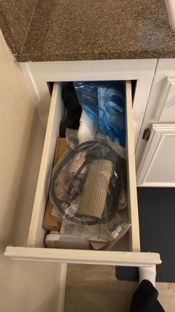 Drawer full of batteries and supplies