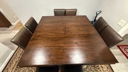 Dining table with 8 leather chairs