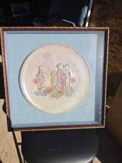 framed ceramic wall plate or pottery artwork