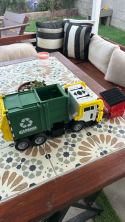 Trash truck toy with dumpster