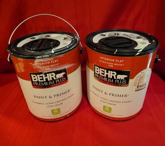 Behr Premium Plus Interior Flat Color Spring Glow Green paint and primer. It is a 100% acrylic, low-odor product with a durable, long-lasting finish.