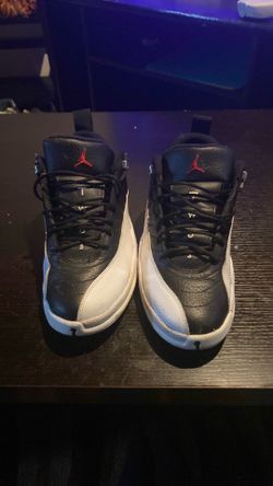 White and black Jordan 12s