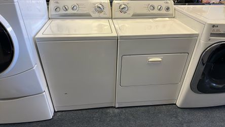 Top load Whirlpool washer and dryer set